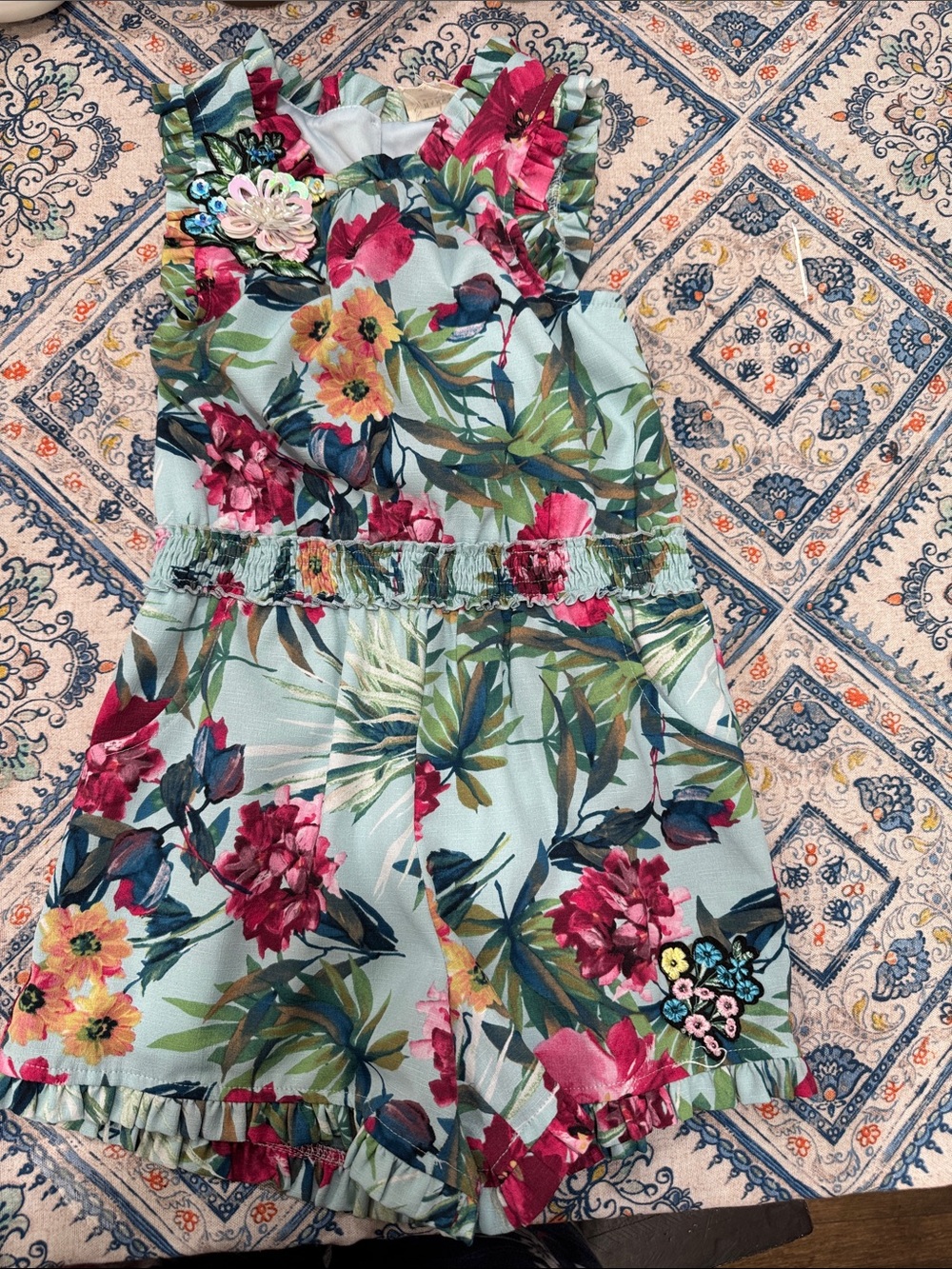 Hanna Andersson Floral Ruffle Romper in Light Blue, Pink & Green